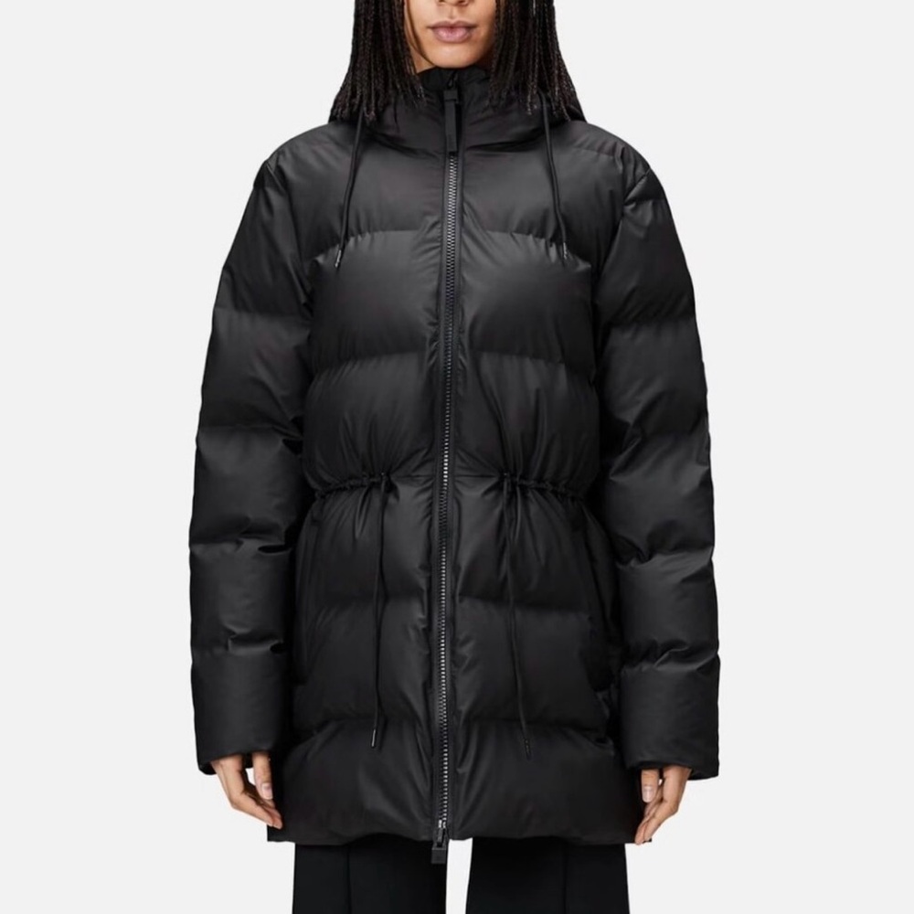 Rains® Alta Long Puffer String W Jacket in Black | sold out online